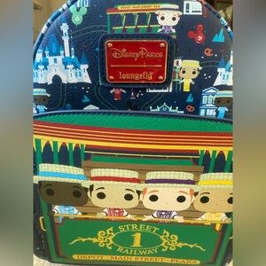 loungefly  disney anniversary Main Street railway backpack like new.